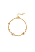 Armband mit farbigen Steinen und Blumen